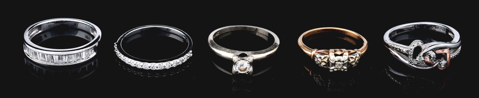 LOT OF 5: GOLD RINGS WITH DIAMONDS.: Lot of five gold rings with diamonds. Four are 14K yellow gold with diamonds, sizes 6, 7 - 1/2, 7 - 1/4 and another 6. The fifth is a 10K and .925 ring with diamond, size 6 - 3/4. Condition: (Excellen