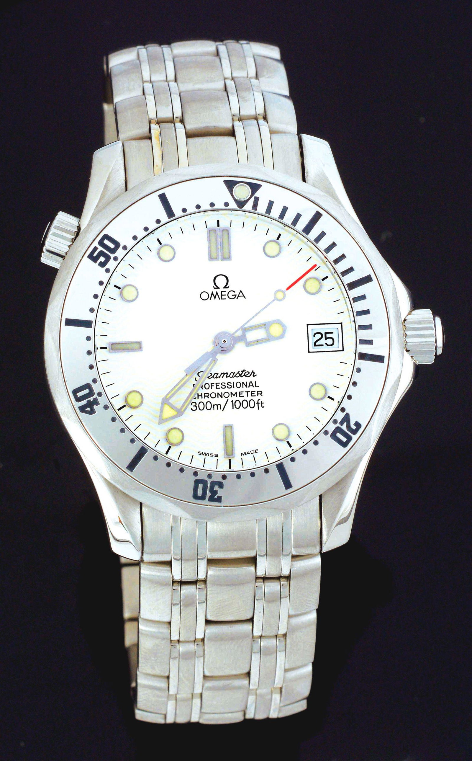 MEN'S OMEGA SEAMASTER PROFESSIONAL AUTOMATIC: Men's Omega Seamaster Automatic Chronometer 300m wristwatch with white wave dial and date. Case diameter is 36mm. All stainless steel case and bracelet with sapphire crystal, rotating bezel and screw-