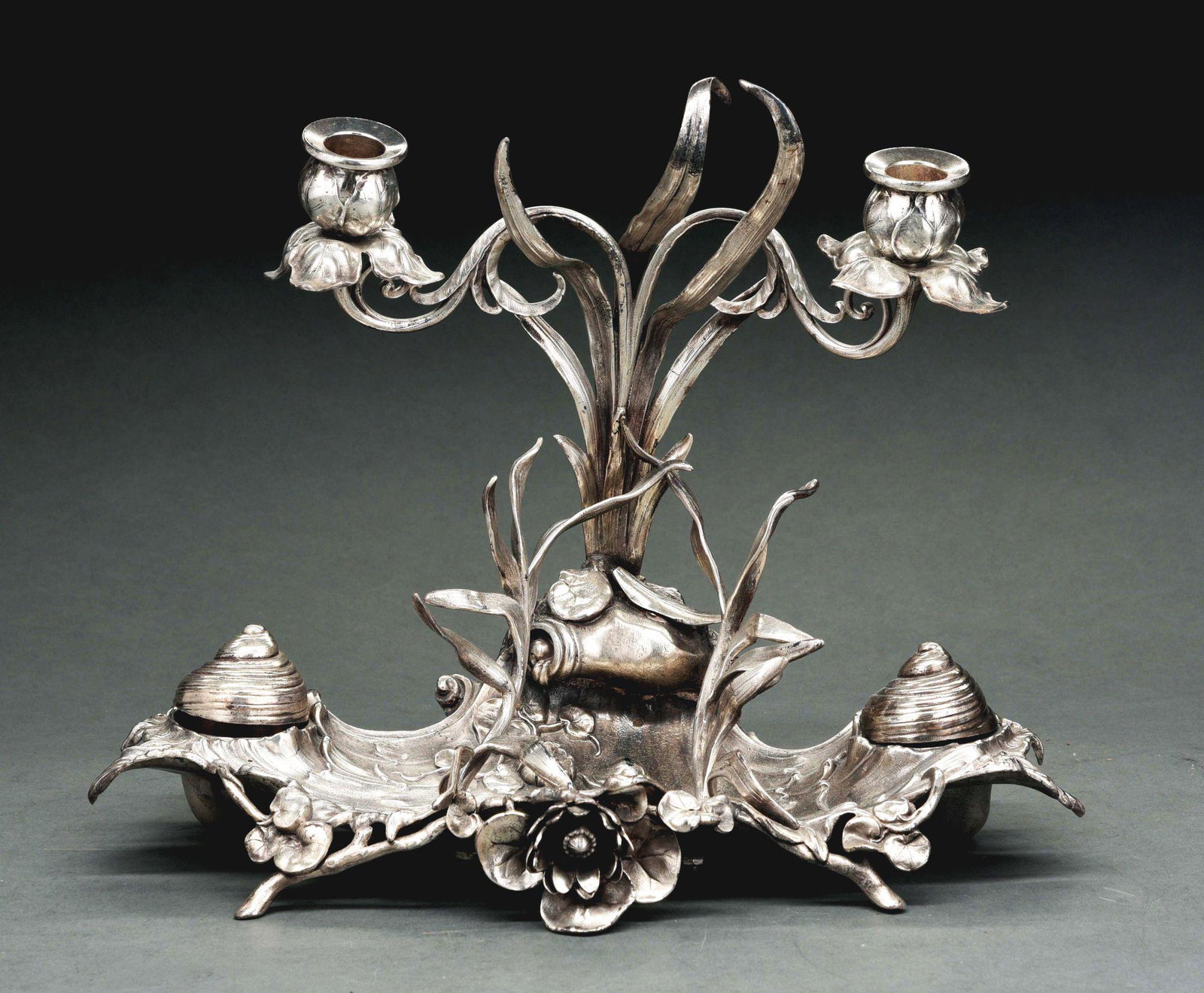 WMF SILVER PLATE DESK SET.: WMF Silver plate desk set for pens, with inkwells with shell lids and a candle holder. One hinge on shell lid needs repair. 12" tall by 13" wide. Condition: (Very Good - Excellent). Dimensions: 11 - 1