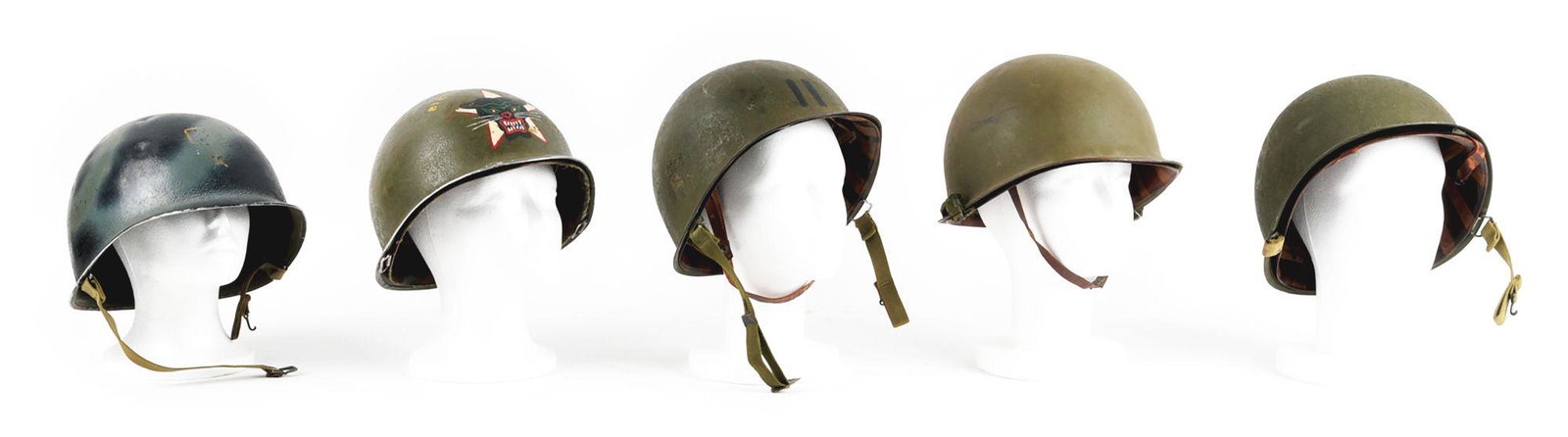 LOT OF 5: US WWII AND POST WWII M1 HELMETS: Lot consists of: (A) WWII US front seam fixed bale helmet with what appears to be post WWII applied navy camouflaged paint. The helmet retains its heat stamp that reads "141B" denoting a McCord contra