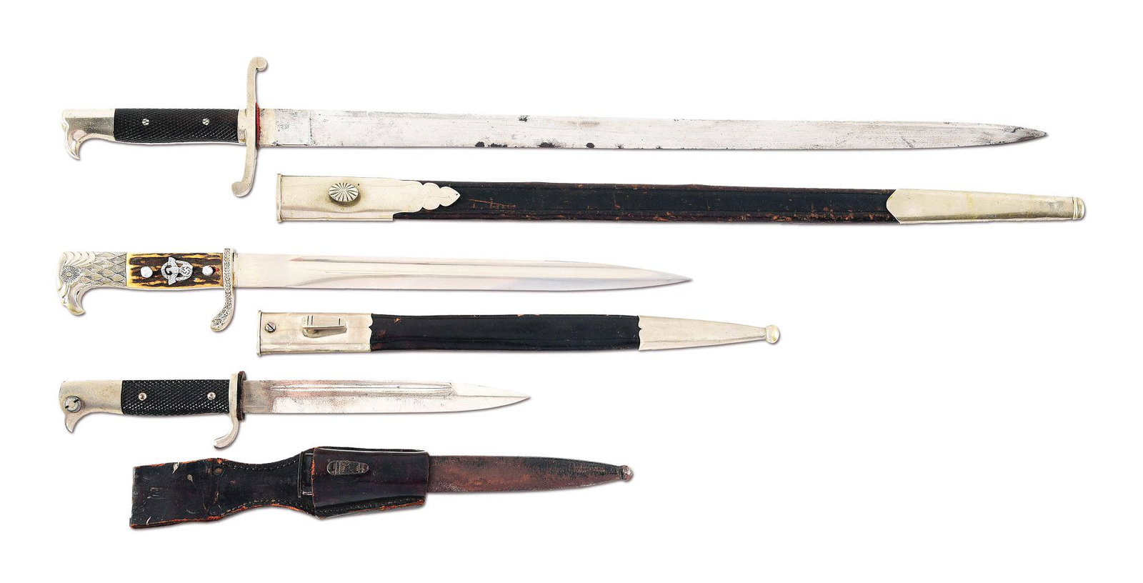 LOT OF 3: IMPERIAL AND WWII GERMAN BAYONETS: Lot contains: (A) An Imperial German bayonet which appears to be of a Hirschfanger style in the shape of a M71 bayonet, but with no provision to attach it to a rifle. Blade is marked with the knight e
