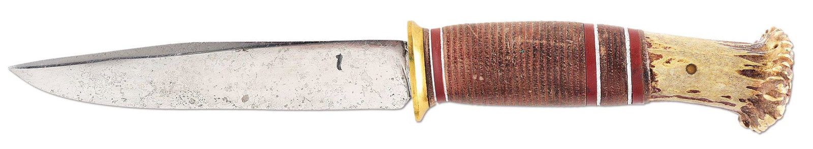 ATTRACTIVE SMALL CROWN STAG SCAGEL HUNTER (1905-1916).: The straight blade is stamped on the left side with Scagel's kris mark. Standard canted brass guard with leather, fiber, and silver spacers followed by a brass pinned crown stag handle. Handle measure