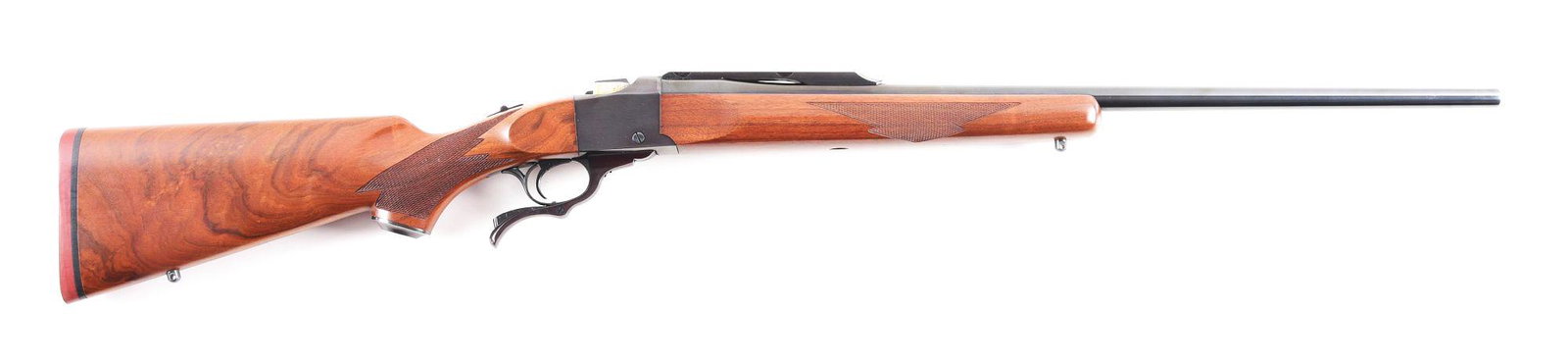 (M) RUGER NO. 1 SINGLE SHOT RIFLE.: Ruger No.1 single shot rifle. Made 1990. Round, steel barrel with no iron sights. Factory blued finish with correct scope rail mounted on the barrel. Oil finished wood sticks with checkering on the wr