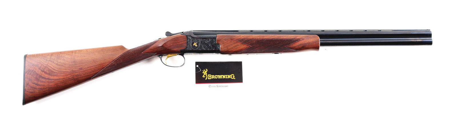 (M) QUAIL UNLIMITED BROWNING CITORI GRADE III SUPER: Quail Unlimited Browning Citori Grade III Super Light over under shotgun with box. Made in 1997 in Japan for Browning. 24" round steel barrels with full vent rib and bead sight. Engraved frame with Qu