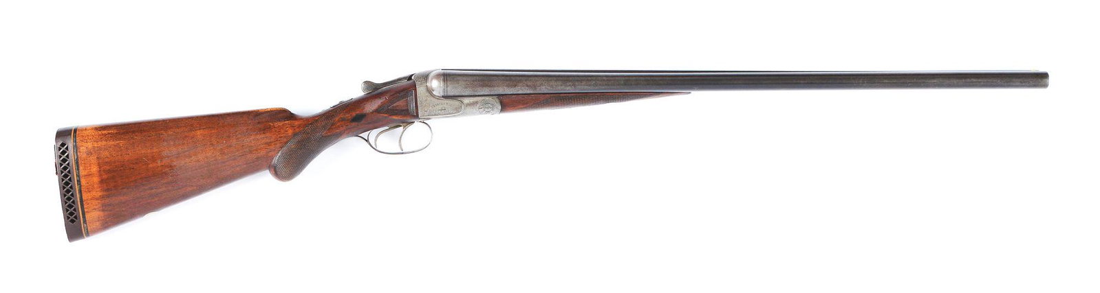 (C) CHARLES DALY SIDE BY SIDE SHOTGUN.: Charles Daly side by side double made by J.P. Sauer and Son Suhl, Germany circa 1920. Krupp fluid steel barrels with matted rib and bead front sight and line engraved breech. Case hardened boxlock act
