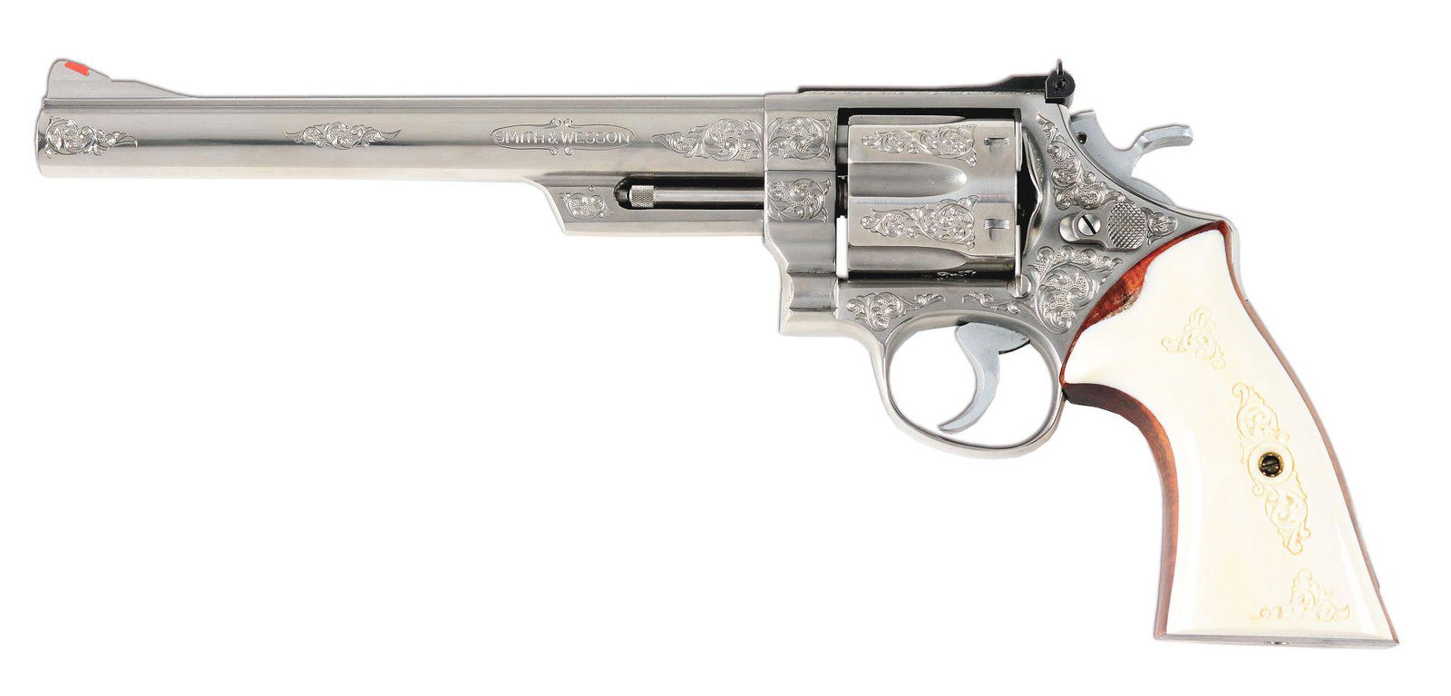 (M) SMITH AND WESSON MODEL 629-1 DOUBLE ACTION: Smith and Wesson Model 629-1 double action revolver. Made mid 1980's. Stainless steel, ribbed barrel with blade front and adjustable rear U notch sight. Scroll engraving work on the barrel, frame and