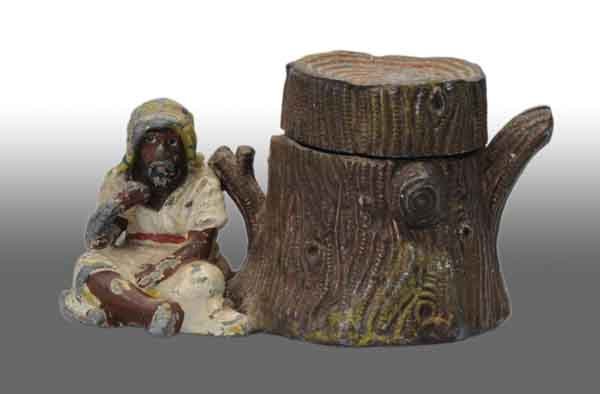 Arab Sitting by Tree Stump Inkwell.: Description Lead metal. Open tree stump to reveal inkwell. No insert present. No damage. Condition (Excellent). Size 1 - 3/4" T.