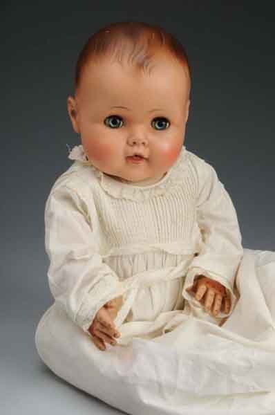 American Character Doll.: Description Includes an all-vinyl baby doll with flange jointed neck, jointed at arms and hips, sleep eyes, and pursed mouth. Doll has some wear and discoloration. Condition (Fair - Good). Size Larges