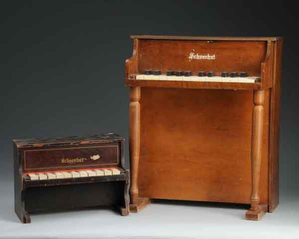 Lot of 2: Schoenhut Toy Pianos.: Description Both play well. Some minimal wear. Condition (Excellent). Size Largest: 20" x 16 - 1/2".