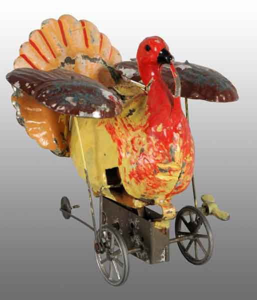 Tin Hand-Painted Turkey Wind-Up Toy.: Description German. Working. Includes third guide wheel on bottom. Very nice action toy, when wound, bellows inside emits a small squeak while articulated wings flap up and down. Minor to moderate pai