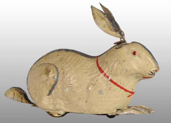 Tin Hand-Painted Rabbit Wind-Up Toy.: Description German. Working. Early spoked original wheels with beautiful original paint. Some crazing and paint chipping throughout. Condition (Excellent). Size 6" L.