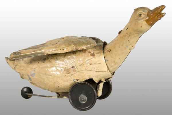 Tin Hand-Painted Goose Wind-Up Toy.: Description German. Working. Has third guide wheel on bottom. When wound, bellows emits clucking sound while head and neck move back and forth. Minor paint chipping and wear. Condition (Excellent). Si