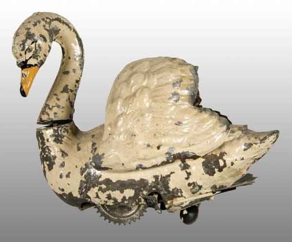 Tin Hand-Painted Swan Wind-Up Toy.: Description German. Working. When wound, toy makes noise and swan's head and neck move back and forth. Very unusual toy with some paint chipping and wear. Condition (Very Good). Size 7" L.