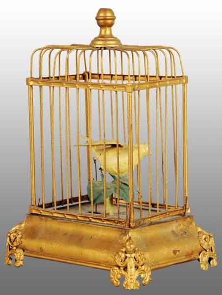 Tin Hand-Painted Birdcage Wind-Up Toy.: Description German. Working. When wound, bird goes up and down. Bellows underneath do not work with possible touchup to gold paint on base. Condition (Very Good). Size 10" T.
