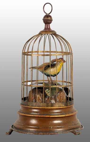 Tin Hand-Painted Birdcage Wind-Up Toy.: Description German. Working. When wound, bird spins around, flaps his wings, and emits chirping noise. Condition (Excellent). Size 10" T.