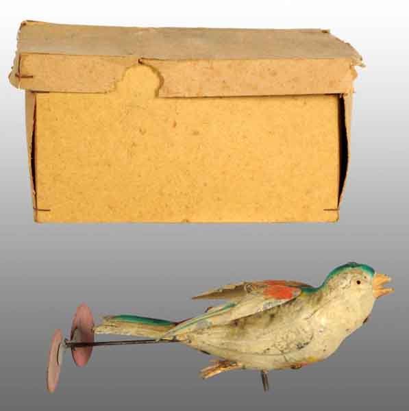 Tin Hand-Painted Bird Wind-Up Toy.: Description German. Working. When wound, cardboard propellers spin in rear. Propellers appear to be original with very minor paint loss. Includes original box marked "Germany" with part of lid missing