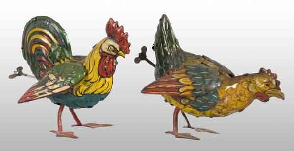 Lot of 2: Tin Litho Rooster Wind-Up Toys.: Description German. Working. Both marked "J.A.J. Made in Germany". Very colorful and beautiful lithography with wings that flap when wound. One has very little wear and other has wear with some oxidat