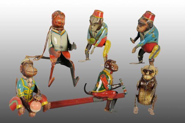 Lot of 6: Tin Monkey Wind-Up & Blow Toys.: Description German. Working. Includes four post-war and two pre-war monkeys. Pre-war monkey toys marked "Made in Germany" with two of the four post-war monkey toys marked "Made in US Zone Germany". Ni