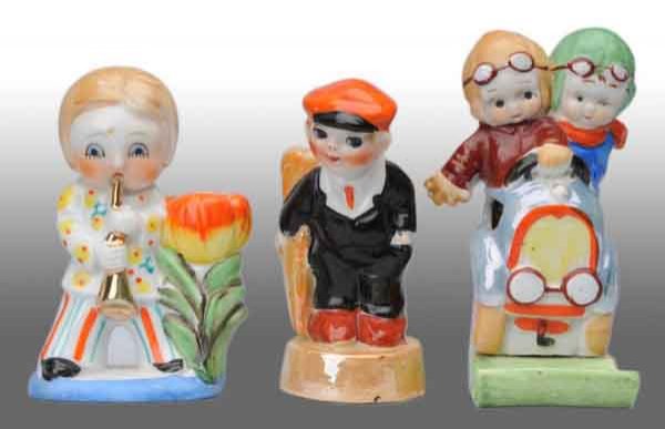 Lot of 3: Children Toothbrush Holders.: Description Includes a golfer, children driving a car, and a saxophone player. All in great condition with wonderful bright colors. Condition (Excellent). Size Largest: 5" T.