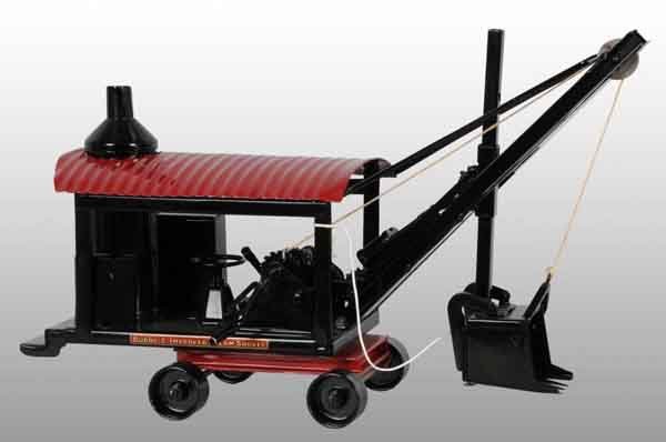 Pressed Steel Buddy L Improved Steam Shovel Toy.: Description Circa 1925. Includes extending boom option. Professional restoration to an original toy. Condition (Restored). Size 21" L.