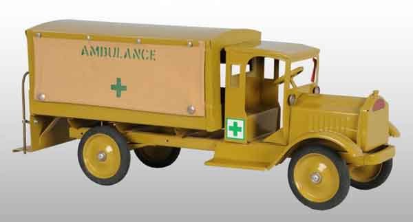Pressed Steel Keystone Packard Army Ambulance Toy: Description Circa 1928. Packard enclosed cab with rear service body and canvas curtains. Includes a reproduction flag. Professional restoration to an all original toy. Condition (Restored). Size 27" L