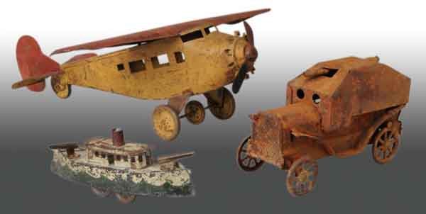 Lot of 3: Pressed Steel Toys.: Description Includes one original Turner single engine airplane, one Dayton armored car, and one Dayton fly-wheel boat. All toys have some rust and/or discoloration and show play wear. Condition (Good