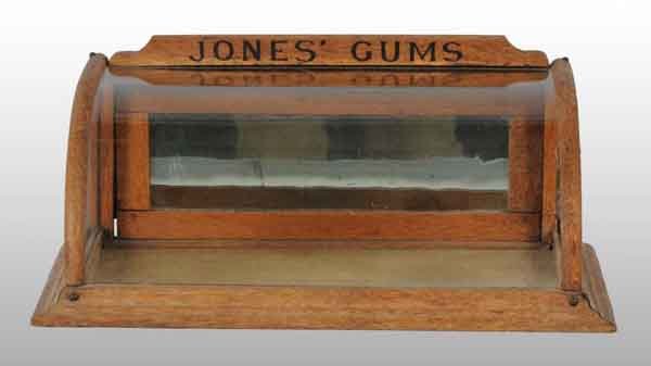 Jones' Gum Case.: Description Lettering appears to have been retouched and back door appears to have been replaced and needs adjustment. Side glass is missing. Condition (Good). Size 7 - 3/4" T.