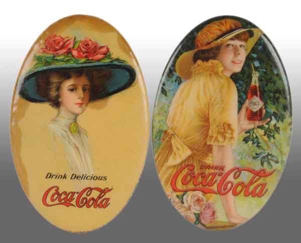 Lot of 2: Celluloid Coca-Cola Pocket Mirrors.: Description 1911 and 1916. Heavy edge foxing with a strong stain and broken mirror to the 1911 version. The 1916 version has wonderful and bright color, a slightly bumpy surface, a good bit of oxidati