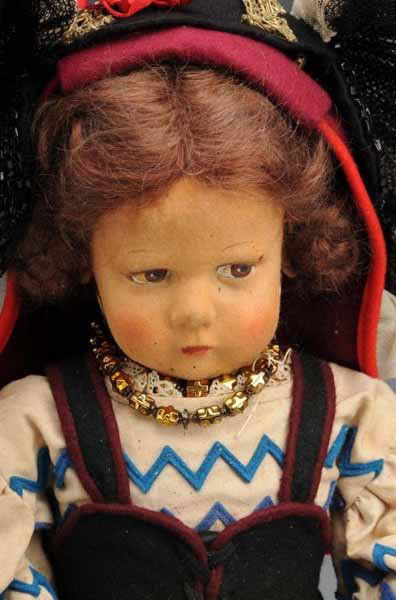 Lenci 300 Series Doll.: Description Italy, Ca. 1928. All felt doll with original mohair wig, painted brown eyes, pouty mouth (may have touch up). All original and colorful pieced-felt Italian Regional outfit with embroidered