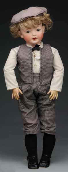 Kley & Hahn 167 Character Boy.: Description Germany, Ca. 1910. Bisque socket head incised "K & H" in banner Germany 167-17 (totally restored and sprayed), blue sleeping eyes, fly-away eyebrows, painted upper and lower lashes, open m