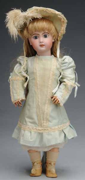 Jumeau Bisque Bebe Doll.: Description French, Ca. 1900. Bisque socket head incised "10" with red Tete Jumeau stamp (hairline on forehead), paperweight eyes replaced human hair wig, open mouth with 6 upper teeth, jointed French