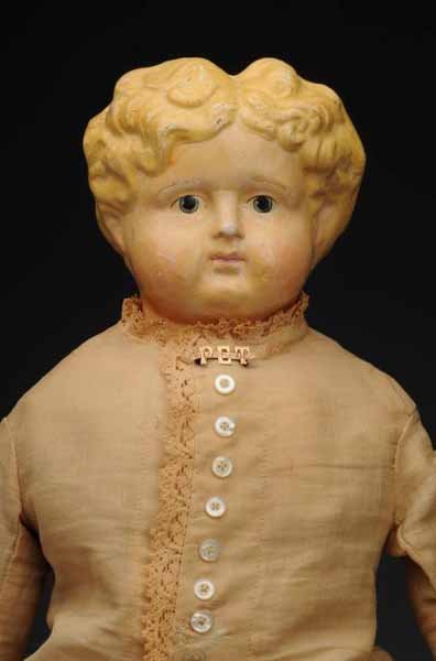 Sonneberg-type Papier-Mache Lady.: Description Germany, Ca. 1870. Papier-mache shoulder head with short curly molded blonde hair, painted eyes, closed mouth (some wear on face). Original cloth body with leather arms (some wear and one 