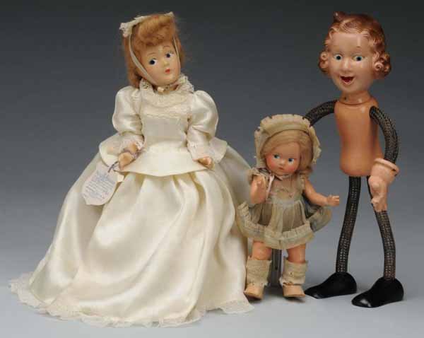 Lot of 3: Composition Dolls.: Description American, Ca. 1930s. Ideal Fanny Brice, molded character face, no clothes. Vogue Toddles marked on foot, painted eyes, original mohair wig, original dress (dusty, light crazing, bad socks)
