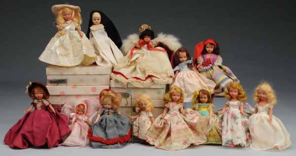 Lot of 13: Nancy Ann Storybooks & Dolls.: Description Includes two hard plastic dolls, including a nun; four bisque boxed dolls; four unboxed bisque dolls, one hard plastic; one composition Queen for a Day; and one other composition. All are 