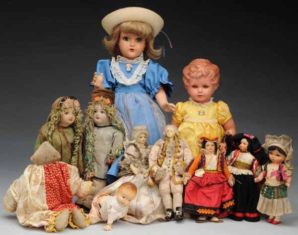 Box Lot of 11: Miscellaneous Dolls.: Description Cloth Colonial pair dressed in satin, cloth Indian pair, cloth clown, hard plastic crawling baby, two Lenci-types, small all original composition girl, 20-inch composition girl (redressed)