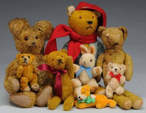 Lot of 8: Old Teddy Bears & Animals.: Description Two yellow mohair bears with straight limbs, mohair bear with big ears and long fur, tiny mohair bear, mohair lying dog, two new animals. Condition (Good - Excellent). Size Largest: 16" T.
