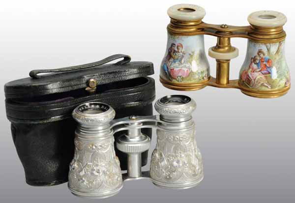 Lot of 2: Pairs of Opera Glasses.: Description Includes one French pair with enamel work and one pair made in Baltimore with intricate silver litho and original leather case. Condition (Excellent). Size 4".