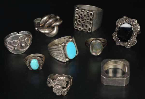 Lot of 9: Antique Jewelry Rings.: Description Includes one with onyx and marcasites, two with polished turquoise, one with abalone shell, one Art Nouveau, and the rest are plain sterling silver. Condition (Excellent).