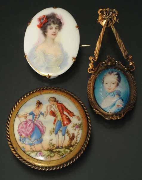 Lot of 3: Antique Porcelain Pins.: Description Includes one Limoge, one depicting a pretty lady, and one under glass. No damage. Condition (Excellent). Size Largest: 1 - 3/4" Dia.