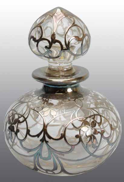 Heavy Silver Overlay Perfume Bottle.: Description Polished pontil and lid. No damage, cloudiness, or cracks. Condition (Excellent). Size 6" T.