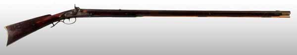 Kentucky Rifle.: Description OL: 56". BL: 41 - 1/2". TB: Octagon to round. LM: Percussion. Original. PB: None. This percussion Kentucky long fowler has a sideplate stamped "H. Schultz". He may have been an owner of th