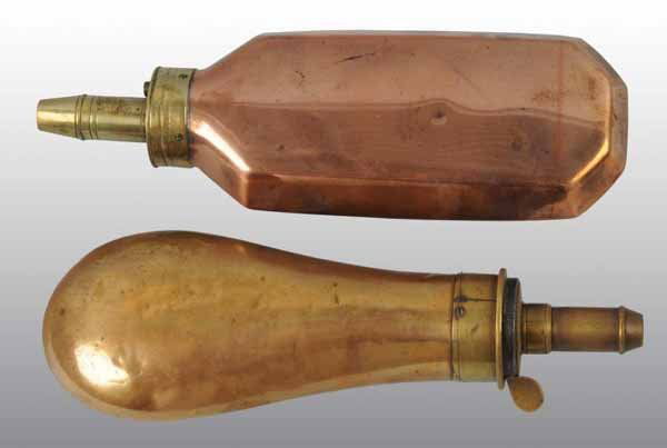 Lot of 2: Brass Metal Gun Powder Flasks.: Description One is missing a spring. One is marked "Flank & Cap Co." Condition (Excellent). Size Both: 8" L.