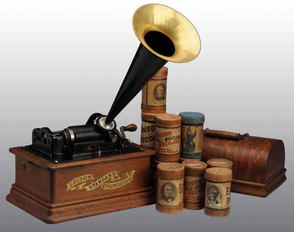 Edison Standard Phonograph Model B.: Description Working. Comes in refinished model D case with reproduction horn and two cylinders. Condition (Excellent). Size 12 - 1/2" T.