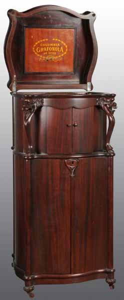 Columbia Grafonola De Luxe Music Box.: Description Lion head copy of the Reginaphone Style 240. Missing tone arm, and bracket. Has some wood repair at hinges. Working. Condition (Excellent).