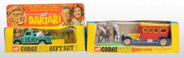 Lot of 2: Corgi Daktari & Hardy Boys Die-Cast Set: Description Circa 1967 to 1976. Includes gift set number 7 Daktari and gift set number 805 Hardy Boys. Toys appear to be unused. Both include their original boxes with some waviness and dirt on fronts