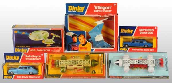 Lot of 6: Dinky Die-Cast Space & Automotive Toys.: Description Circa 1970s. Includes number 359 Eagle Transporter, number 358 U.S.S. Enterprise, number 357 Klingon Battle Cruiser, number 360 Eagle Freighter, number 124 Rolls Royce Phantom V, and numbe