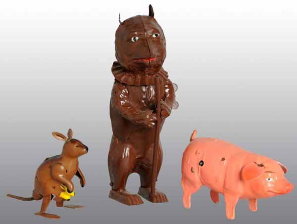 Lot of 3: Animal Wind-Up Toys.: Description German and Japanese. Working. Includes one tin hopping kangaroo with baby in pouch, one composition pig with partial Germany stamp on stomach, and one tin bear holding a pole. Toy bear app