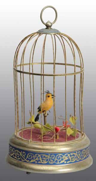 Bird in Cage Wind-Up Toy.: Description European. Working. When wound, bird chirps. Original ring on top. Condition (Excellent). Size 9" T.