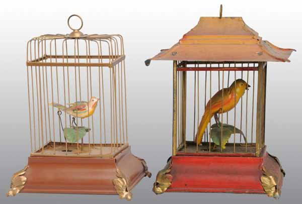 Lot of 2: Hand-Painted Bird in Cage Wind-Up Toys.: Description German. Both have bellows that chirp but only one is working. Includes one restored toy and one toy with moderate paint flaking throughout roof. Condition (Very Good). Size Both: 8" T.