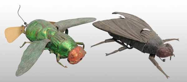 Lot of 2: Tin Hand-Painted Fly Toys.: Description German. Working. Includes one wind-up and one weighted pull toy with propellers on rear. Both toys have wings that move up and down when operated. Cardboard propellers are probably not ori